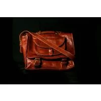 Leather Tour bag front view with strap